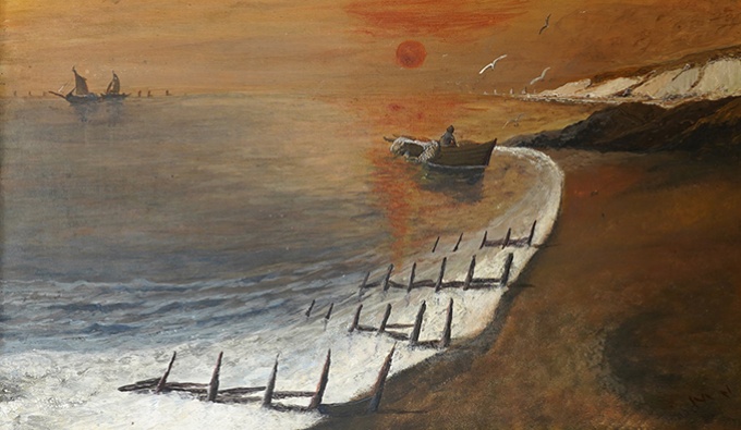 A view of a shoreline stretching into the distance. Wooden posts are on the waters edge and the sun sets in the sky of orange hues.