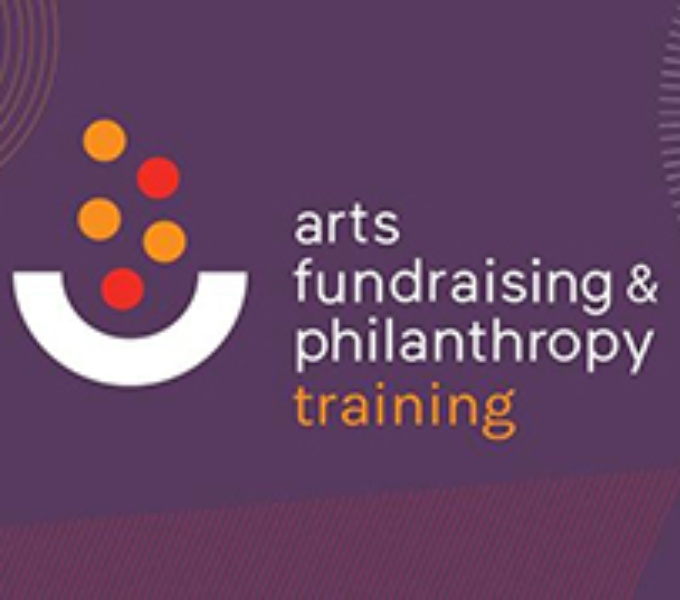 A purple background, To the left is a white semi circle holding orange and red balls. To the right in white text is the organisation name: arts, fundraising and philanthropy. Below in yellow text is the word; training.