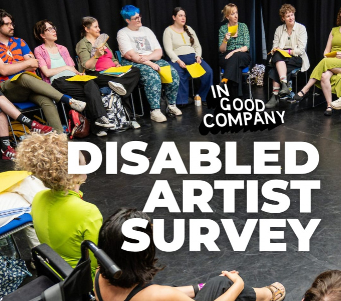 A photo taken from our Common/Wealth workshop at Departure Lounge 26. A group of people sit around a circle, some on chairs, some sat on the floor. They're doing a workshop, and have yellow paper on their laps. Text on top reads IGC Disabled Artist Survey