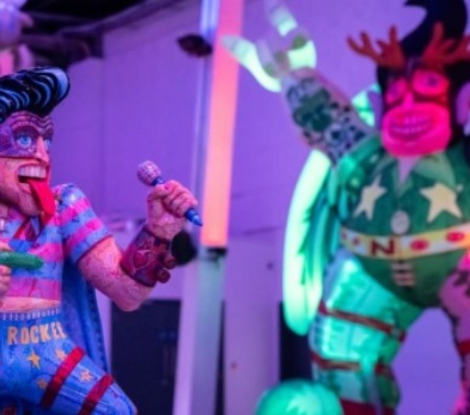   A cropped image of two Elvis-like figures from Jason's exhibition
