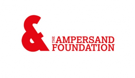 A large ampersand and to the right, The Ampersand Foundation in red text on a white background. 