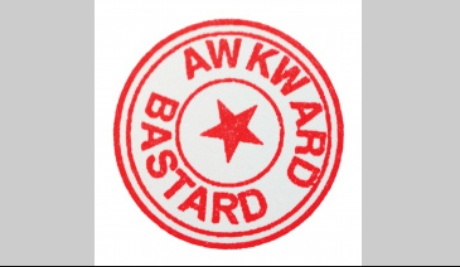 A rubber stamp design. A red five pointed star sits in the centre, surrounded by a circle and the words 'Awkward Bastard', two more circles surround the words.