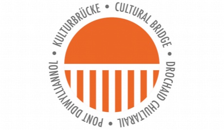 A basic white bridge across an orange circle surrounded by the words Cultural Bridge written in English, Welsh and German