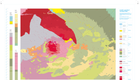 A geological map with lots of areas in different colours, from cold, soft greens on the right hand side of the page to bright red, pinks and oranges just left of centre of the page.