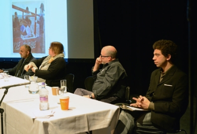 Panel sat on stage at the Awkward Bastards Symposium